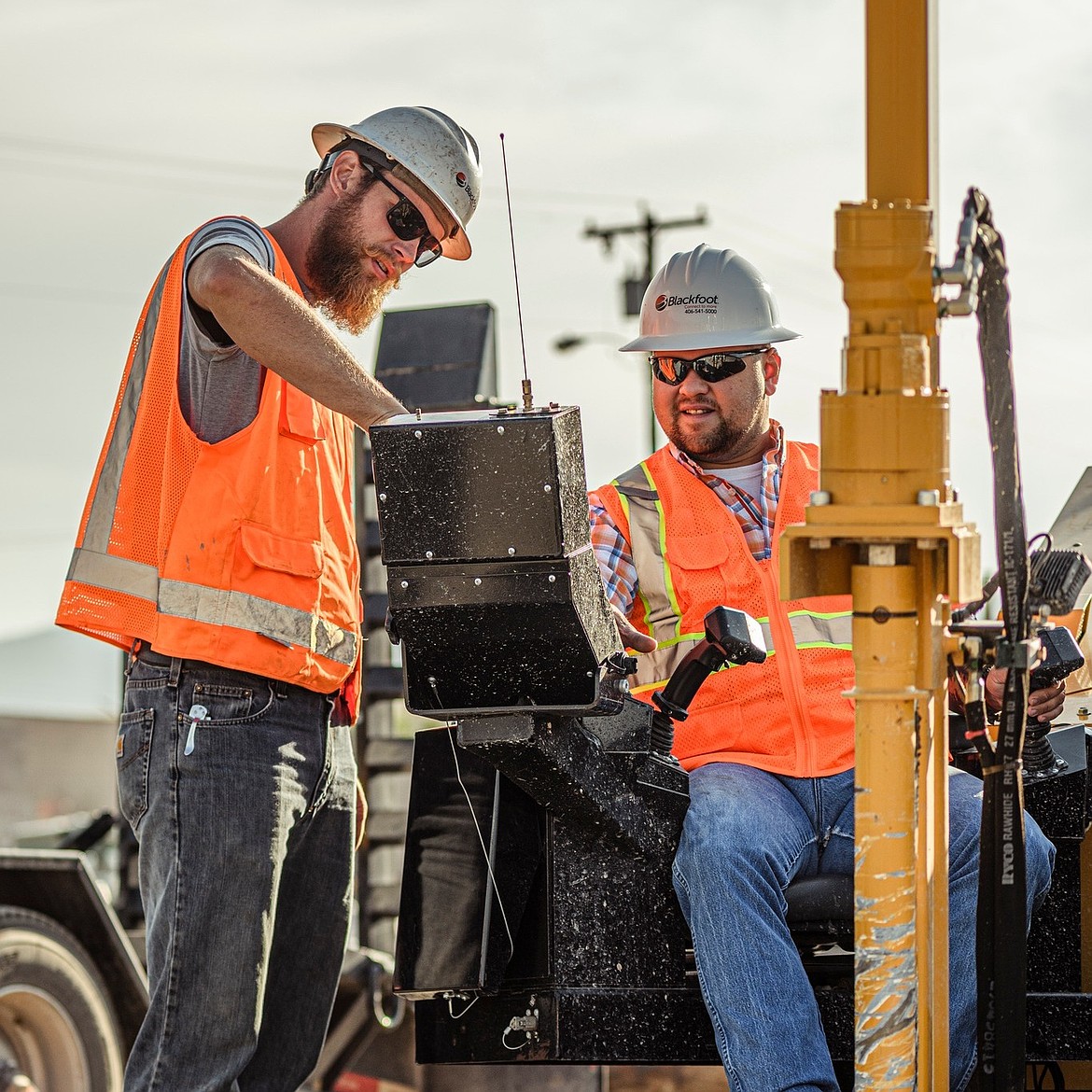 Fiber optic technicians with Blackfoot Communications working on-site. (photo courtesy of BroadbandMT)