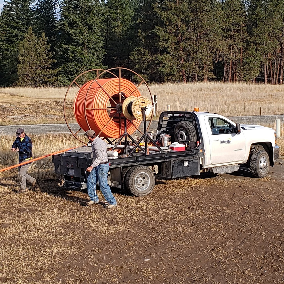 Fiber optic cables being ran off an Interbel truck. (photo courtesy of BroadbandMT)