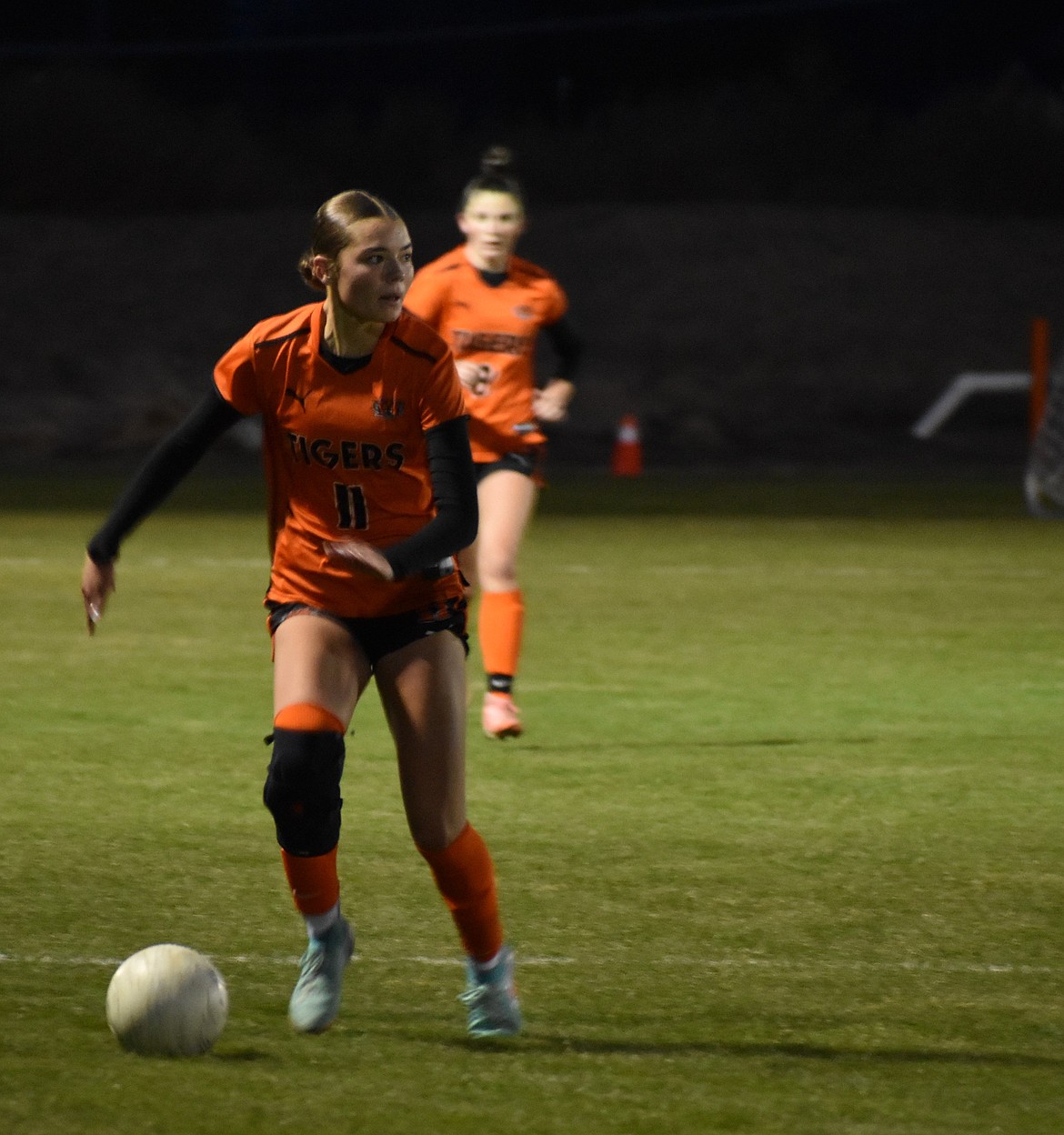Paige Murray from the Tigers moves the ball along the sideline and keeps it out of Ellensburg’s possession during Tuesday’s matchup.