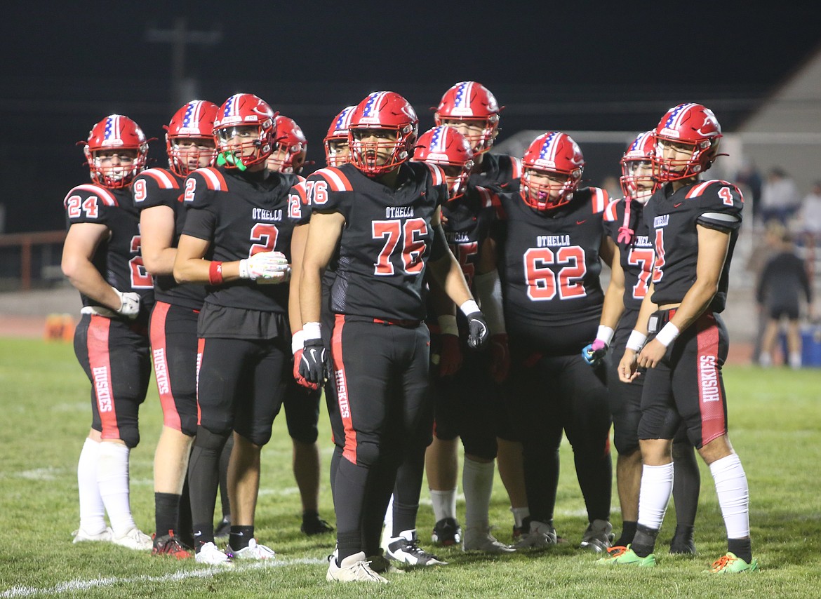 The Huskies offense look to the sidelines for the next play call. The Huskies defeated Toppenish 41-23 on the road on Friday.