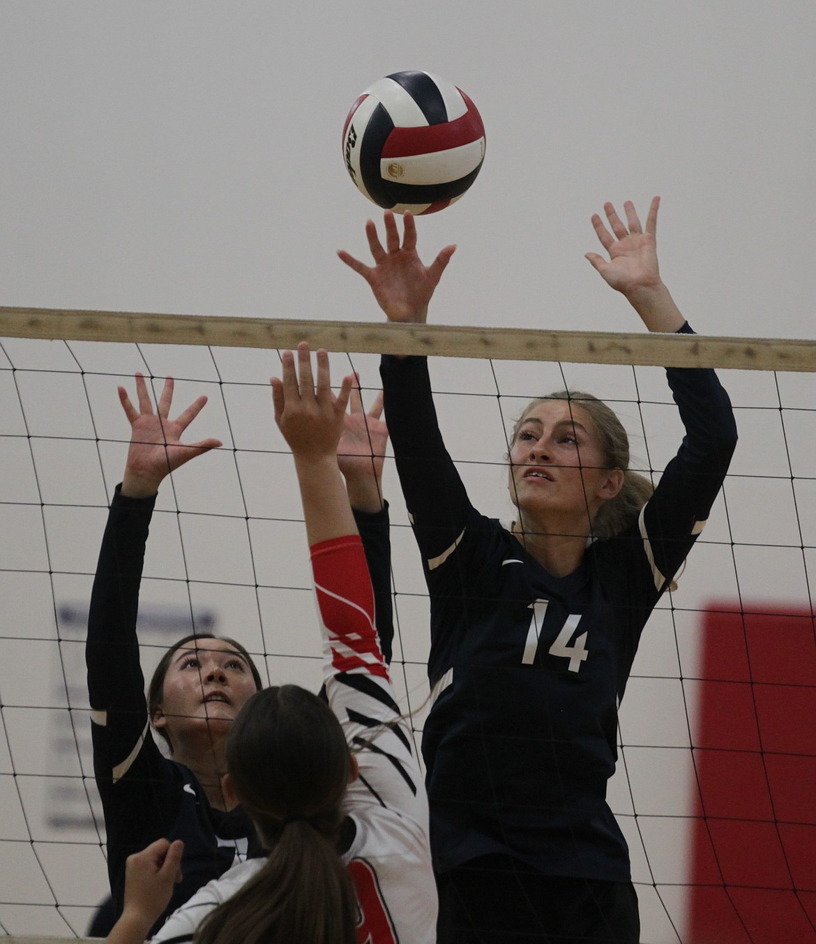 MARK NELKE/Press
Sadie Harrington (7) and Angelica Ross (14) of Coeur du Christ in action against Kootenai earlier this season.