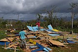 Hurricane Melissa left dozens dead and widespread destruction across Cuba, Haiti and Jamaica, where roofless homes, toppled utility poles and water-logged furniture dominated the landscape Wednesday.