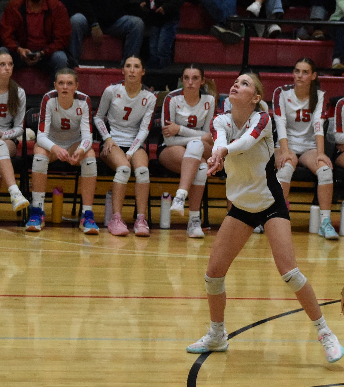 Huskies senior Abbie Douglas prepares to receive the ball during the game against Toppenish. Douglas said she was nervous coming into this game, but knew this was a must win for the Huskies to continue their postseason push.