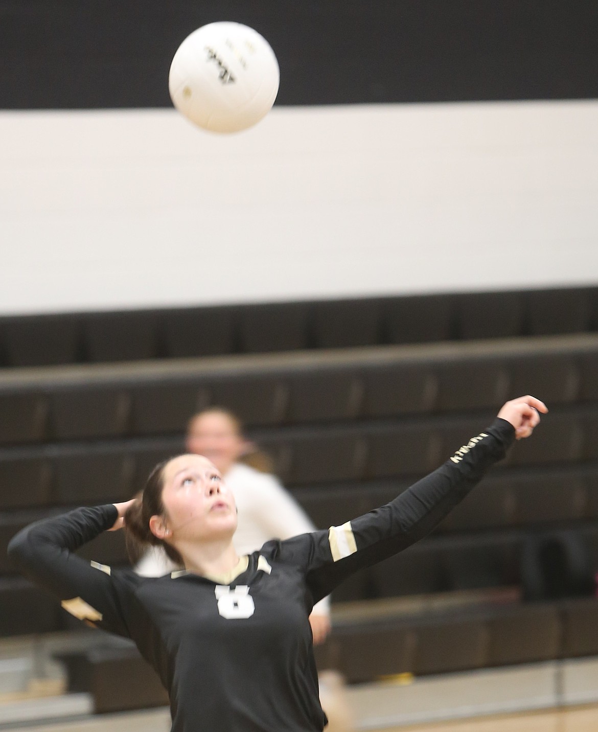Heaven Parker (8) leaps in the air to serve the ball against Cashmere earlier this season. The Knights are the eighth seed in the 1A district tournament and will face top seeded Chelan on Saturday.