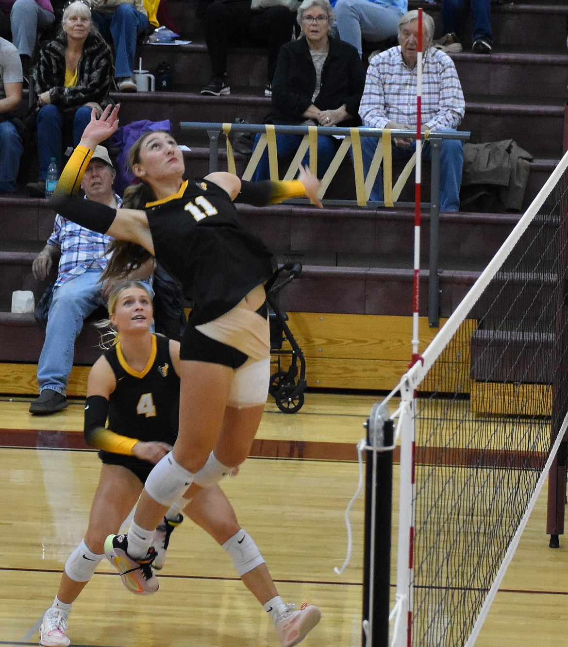 Mavs senior Kardyn Martinez (11) goes for the kill during Thursday’s game against Eastmont. Martinez earned 12 kills and 19 blocks during the matchup.