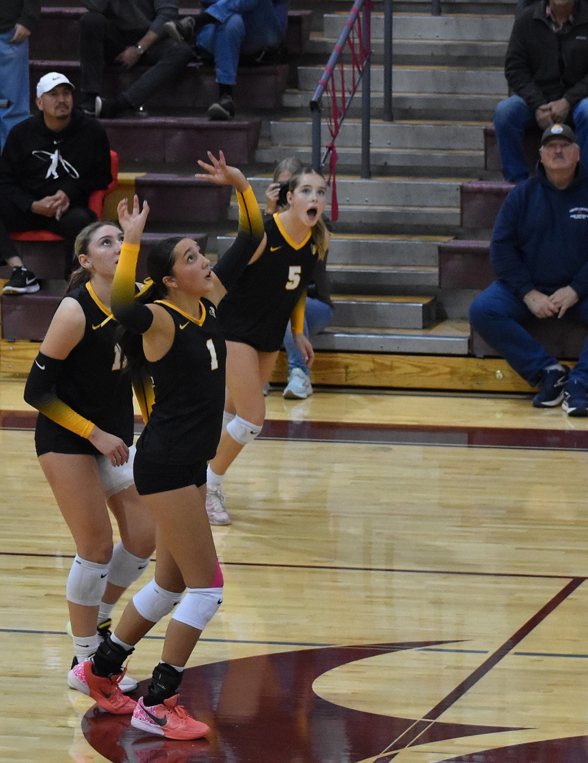 Mavs senior Lilliana Roylance (1) sets the ball for one of her teammates to go for the kill during Thursday’s game. Roylance earned eight kills and made 13 blocks during the course of the team’s five set match.