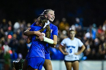 Columbia Falls' Onnikka Lawrence (10) celebrates with Tatiana Raymond (2) after a goal by Lawrence in the second half of the Class A state championship at Flip Darling Memorial Field on Saturday, Nov. 1. (Casey Kreider/Daily Inter Lake)