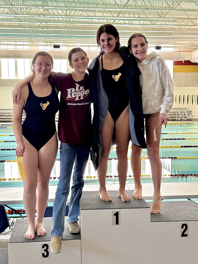 The Mavs dive team stands together following their competition on Thursday.