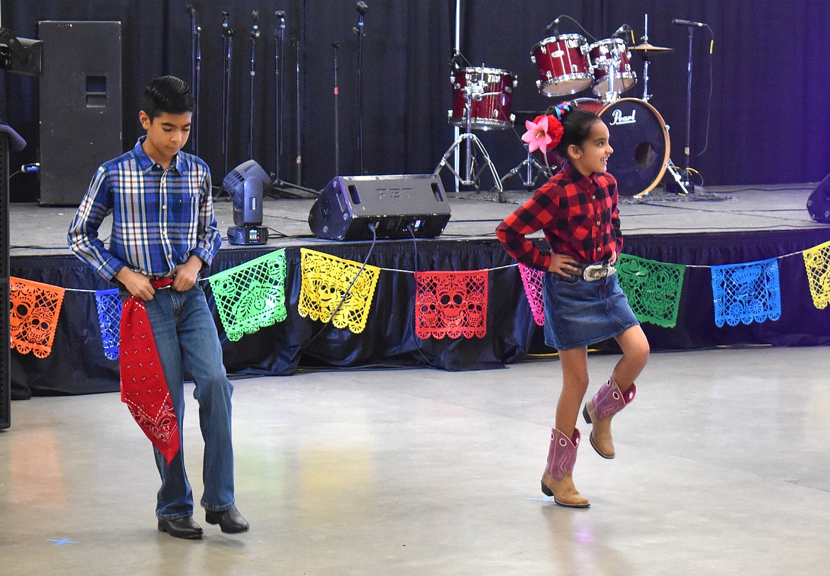 Dancers from Folklorico Our Lady of Fatima perform at the Moravida Festival on Saturday. Although the event commemorates those who have died, it represents celebration rather than a time of grief.