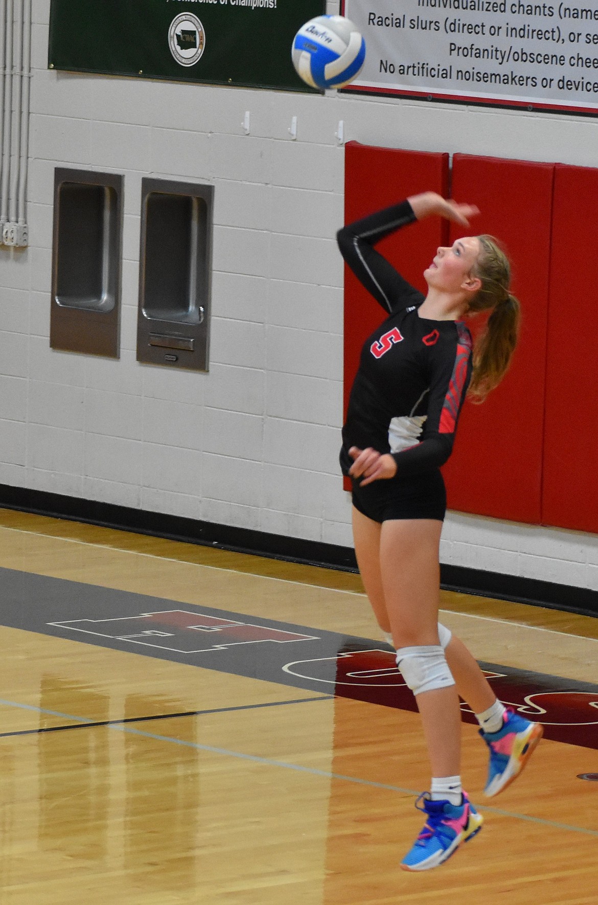 Shaylee Freeman, an Othello senior, serves the ball during a previous matchup this season. Huskies Head Coach Steve Parris said the seniors on the team this season showed the younger players what is possible when you play your hardest.