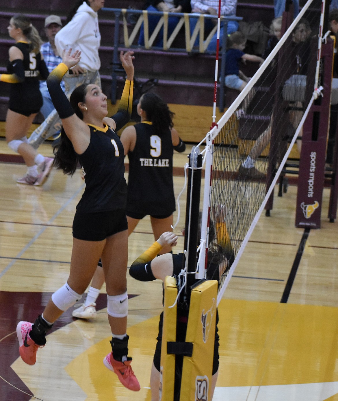 Lilliana Roylance, a senior for the Mavs, goes for the kill during a warmup before a game. Roylance was recognized for her efforts throughout this season with an honorable mention for All-League.