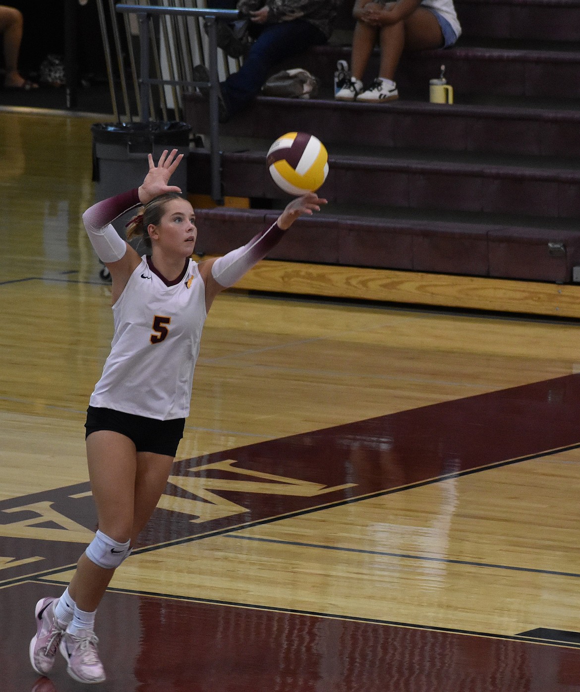 Mavs player Madison Witwer sets herself up to serve the ball during a previous matchup this season. Witwer earned an honorable mention for All-League and acts as a quiet leader on the team, according to Mavs Head Coach Krystal Trammell.