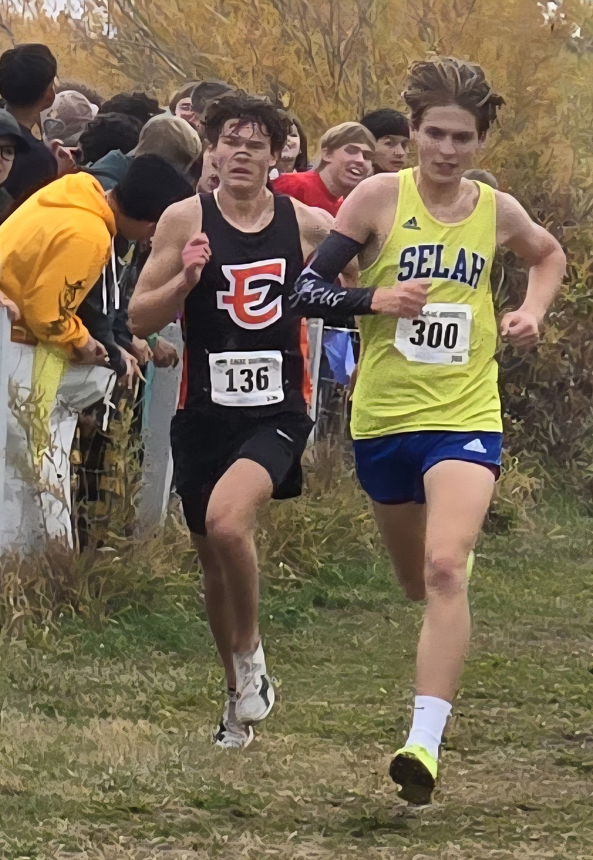 Tigers senior Maddax Iverson follows behind a runner from Selah during the CWAC District Championship over the weekend. Iverson finished 14th to make his fourth state appearance.
