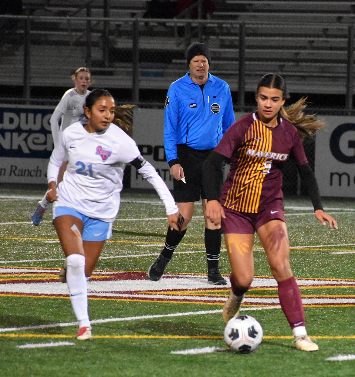Moses Lake’s Mikayla Sawyer works to maneuver around a player from West Valley during the first round of districts on Tuesday.