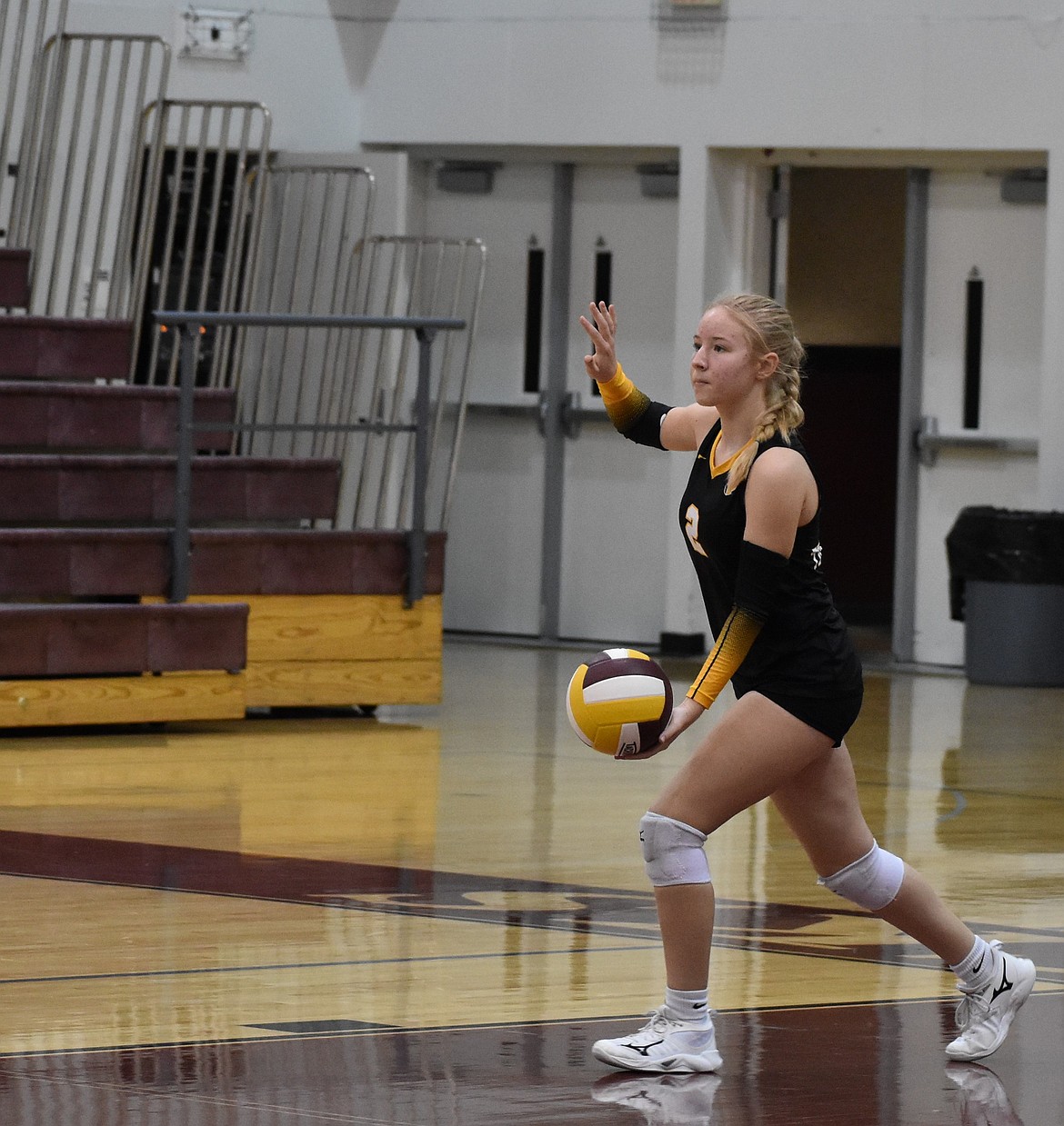 Moses Lake’s Alivia Dehoog prepares to serve the ball during Tuesday’s game against Eisenhower.