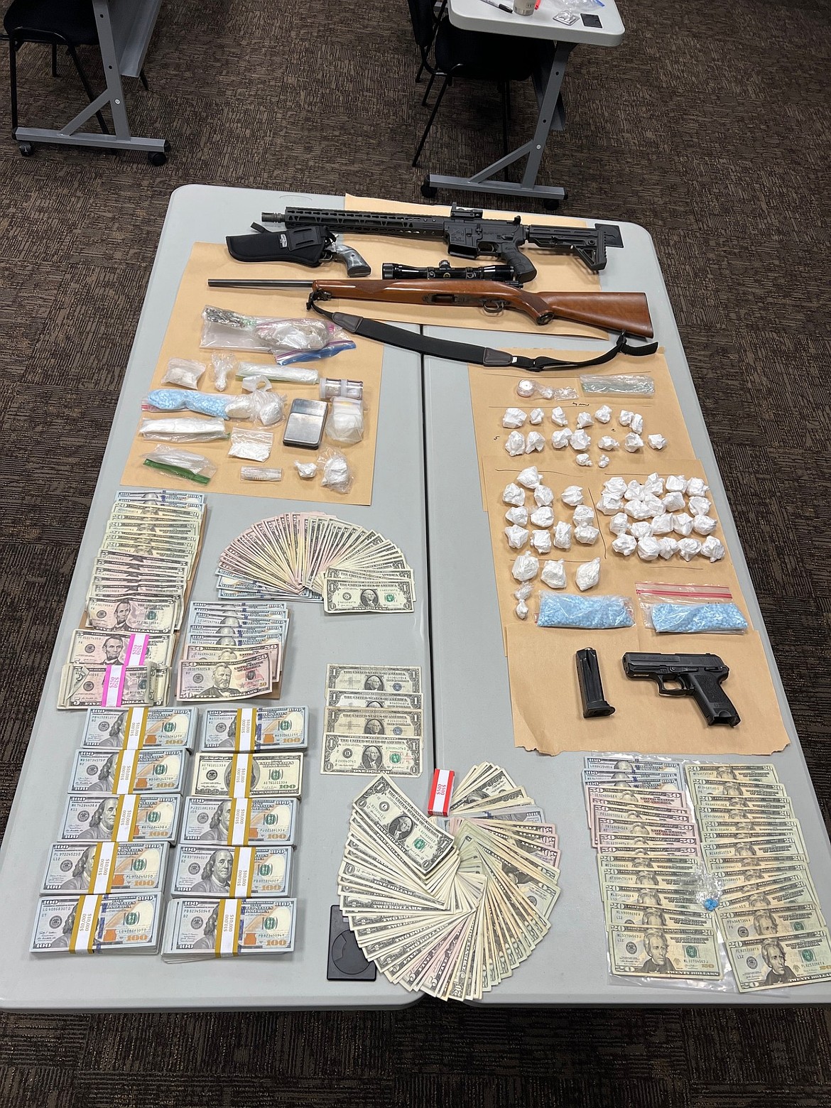 Moses Lake Police Department detectives and agents with the Bureau of Alcohol, Tobacco and Firearms seized drugs and money after serving multiple search warrants.