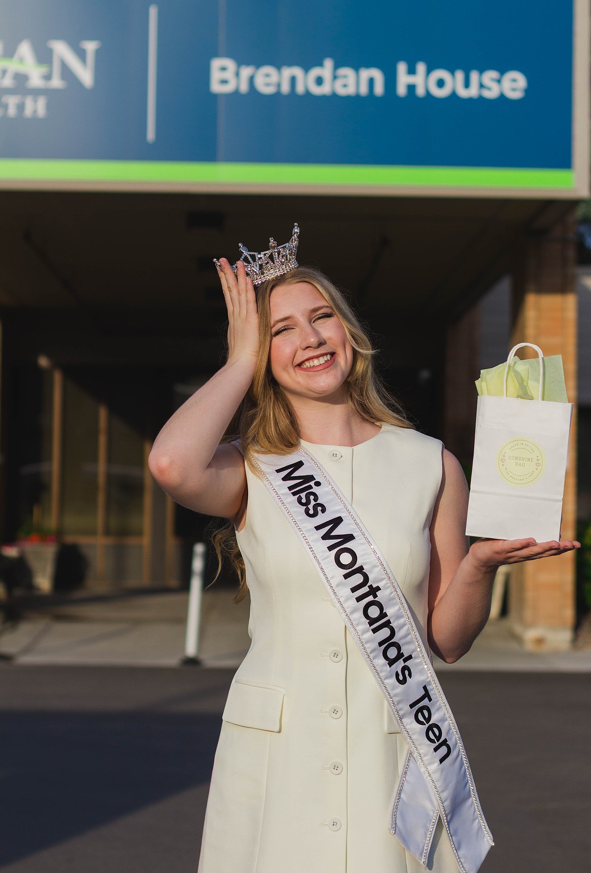 MISS MONTANA’S Teen, Marygrace Knuffke delivers “Sunshine Bags” to residents at the Brendan House. The visit is part of her community service initiative: Grace in Action for Those Who Came Before Us. (Courtesy photo)