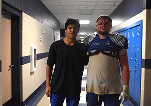 Soap Lake seniors Fransisco Ortega and Abram Cox stand together in the halls of the high school following their final football game. Both seniors expressed how grateful they were for the opportunity they had to be part of the Eagles program and their excitement for their future.