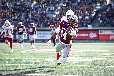 Grizzlies wide receiver Korbin Hendrix (14) catches a 29-yard touchdown reception in the first quarter against Eastern Washington at Washington-Grizzly Stadium on Saturday, Nov. 8. (Casey Kreider/Daily Inter Lake)