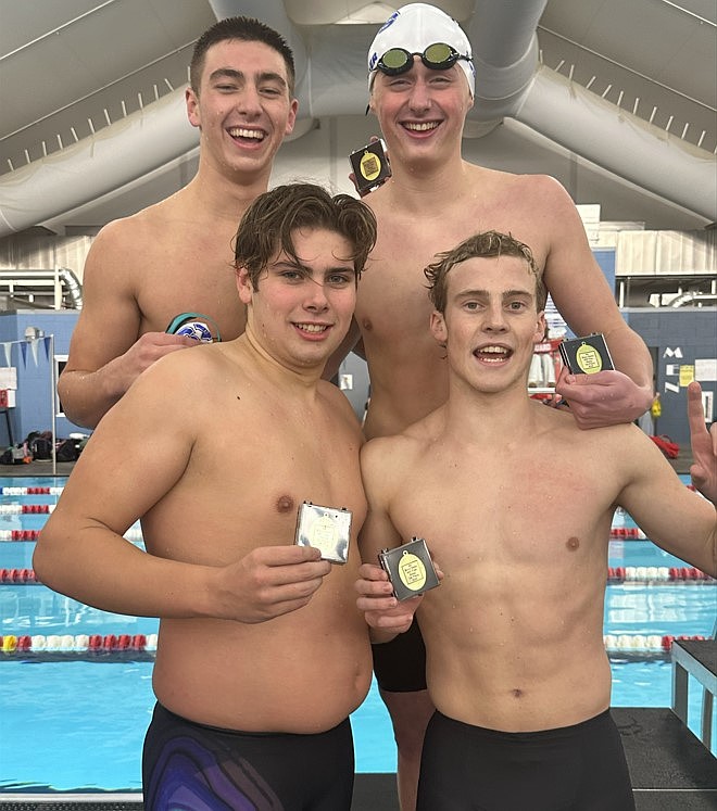 Courtesy photo
The Coeur d'Alene boys 400 freestyle relay team won the state 6A title at the Idaho Central Aquatics Center in Boise. in the front from left are Andrew Davis and Owen Keith. In the back are Dawson Cushman and Jace Voeller.