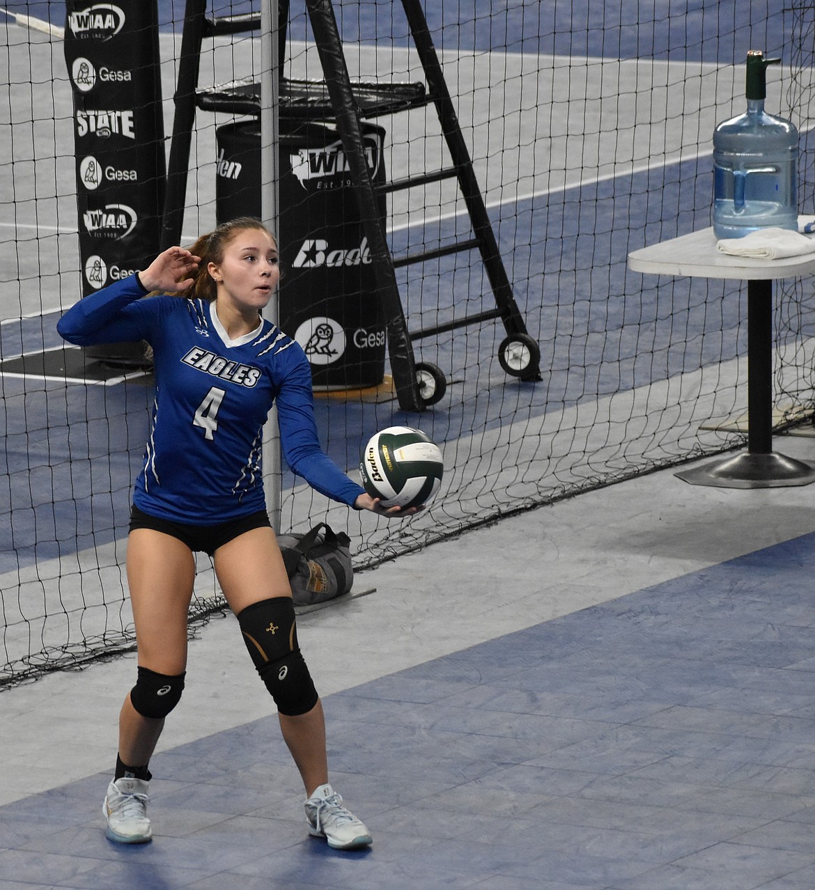 Sage Hart, one of the Eagles’ senior players, prepares for her next serve during the state tournament.