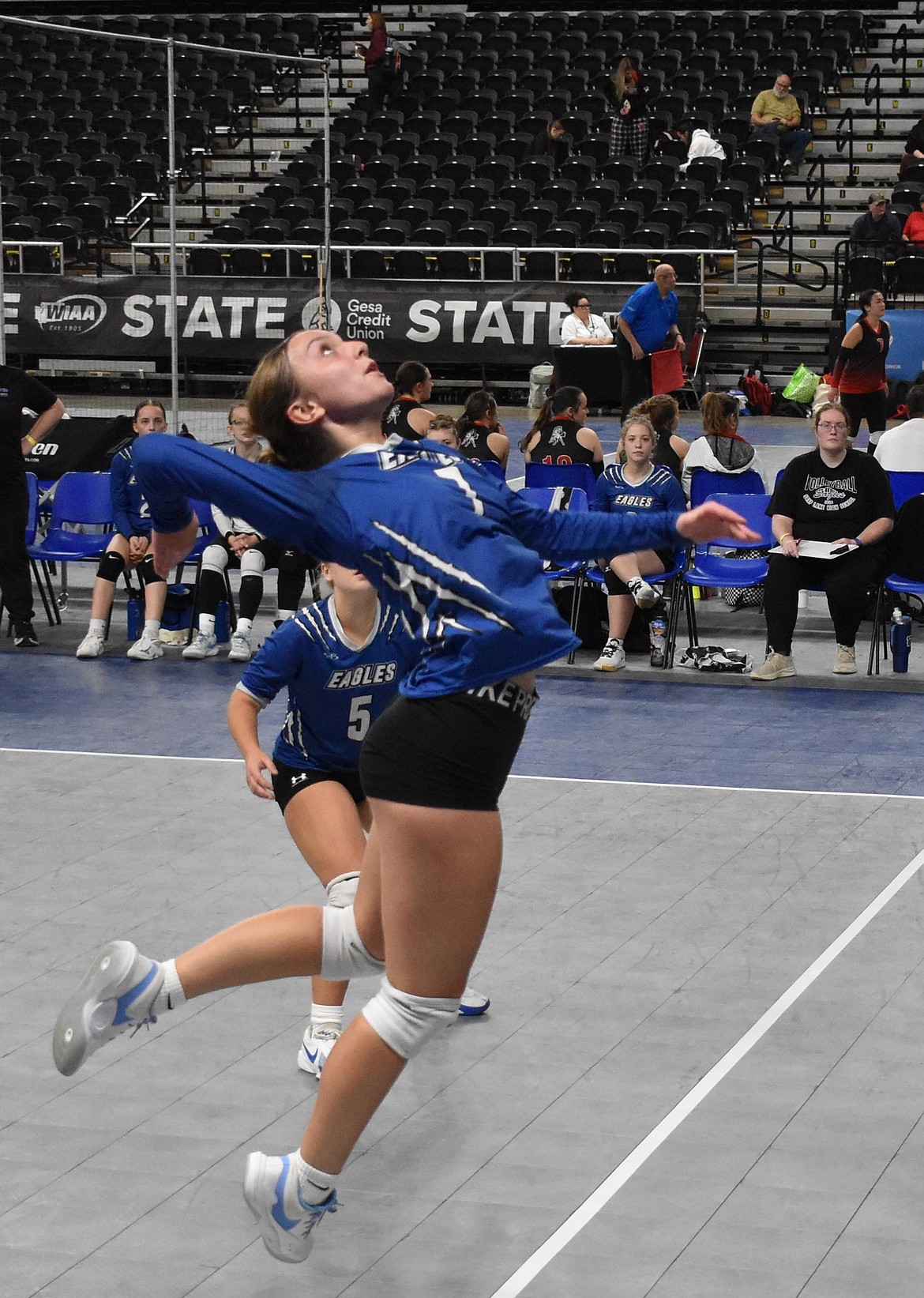 Soap Lake freshman, Marina Zubritskiy gets ready to slam the ball back over the net during the third set against Wakiakum.