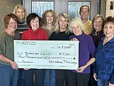 Lady golfers swing for Safety Net