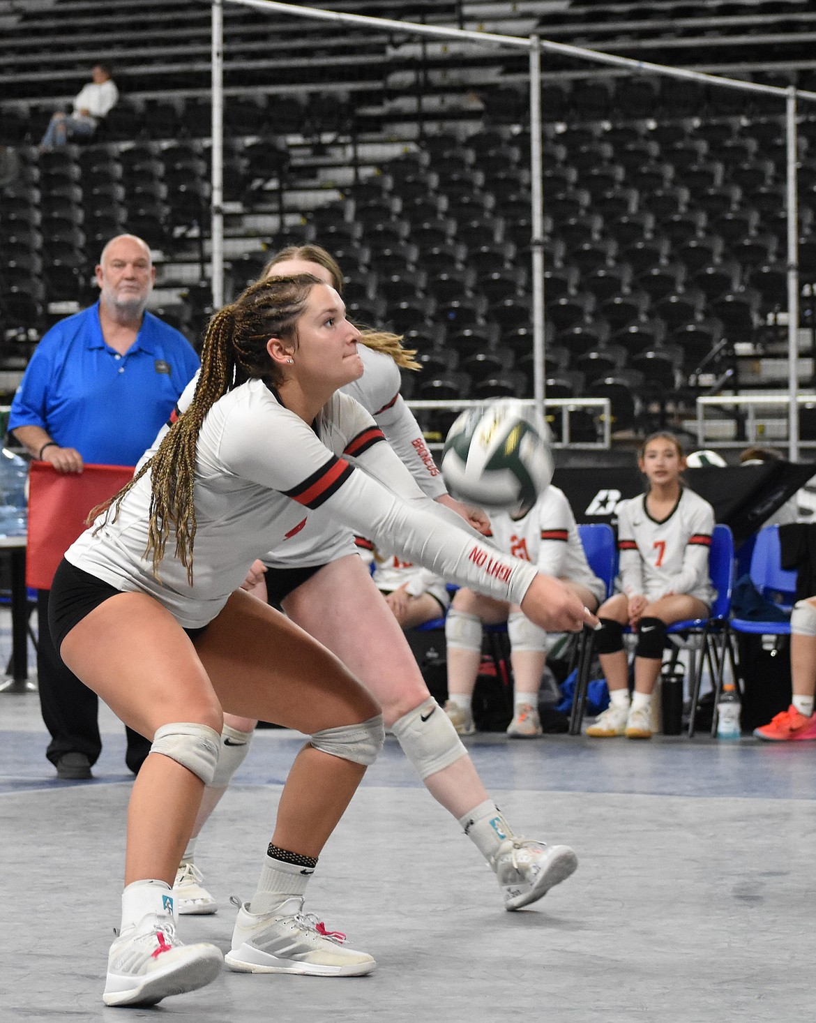 Saige Galbreath, an LRS senior, hits the ball sent over by a serve from Manson during the third/fourth place game in the state tournament on Thursday. Galbreath said it was a very exciting moment for her to end off her career with the Broncos volleyball team with a win.