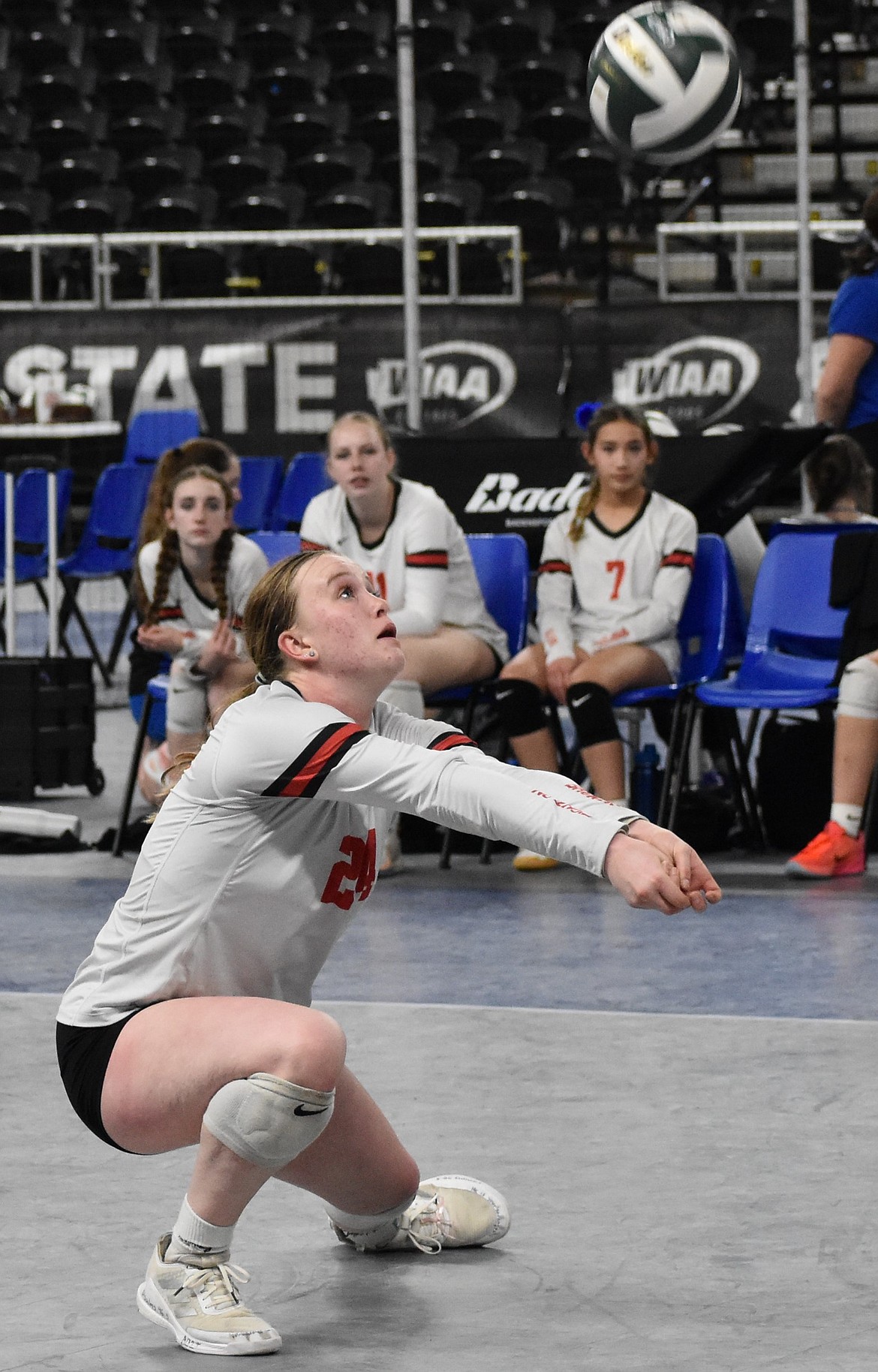Broncos senior volleyball player Hannah Towne gets down low to hit the ball during the battle against Manson. Head Coach Cari Galbreath said the three seniors all contributed successfully in their roles throughout the season.