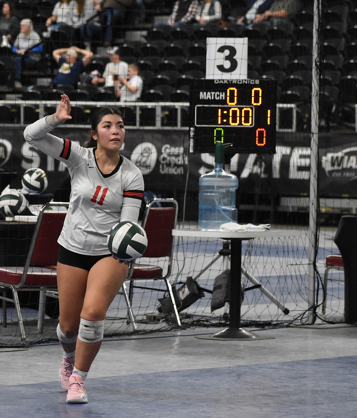 Allesandra Mendez, a junior for the Broncos, walks up to serve the ball during the game against Manson on Thursday.