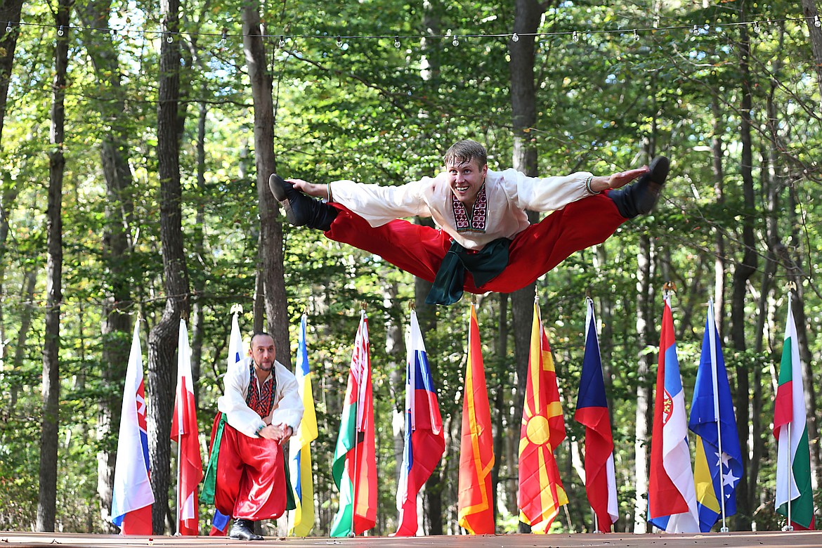 Barynya dancer Vladimir Nikitin takes a leap in a traditional Ukrainian dance called Hopak at an international festival. Some of the troupe’s performers are on a tour of Basin schools sponsored by Columbia Basin Allied Arts.