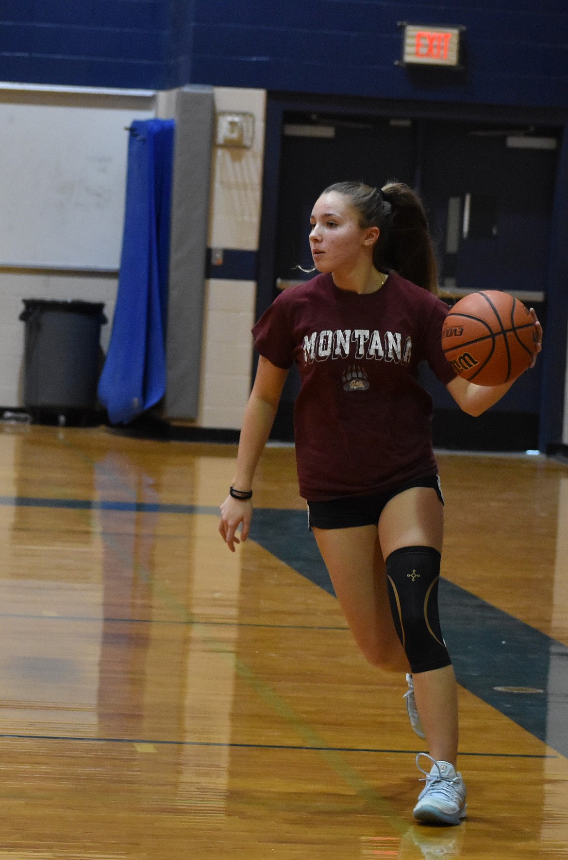 Sage Hart, a Soap Lake senior, grabs the ball under the net and makes her way back to the center of the court during preseason practice. The Eagles enter the season with all of their returning players from last season.