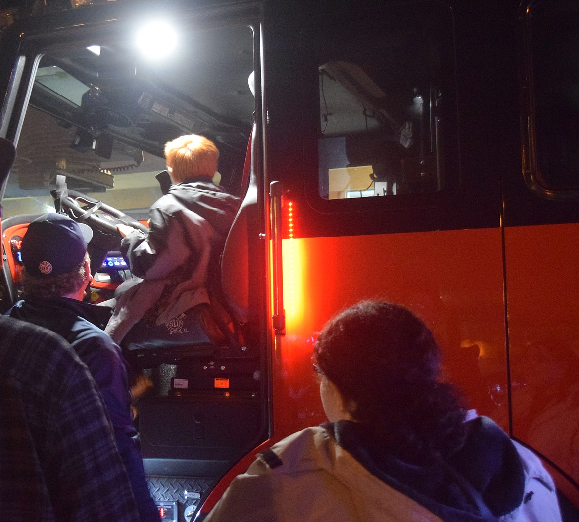 Moses Lake’s Downtown Tree Lighting included a fire engine children could climb into and explore.