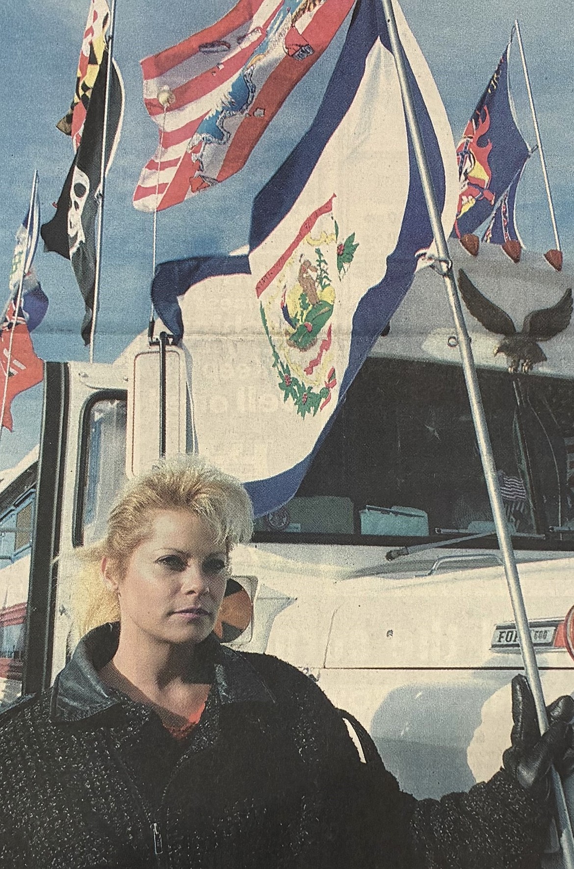 Melody White follows in the footsteps of her father, Melvin (Flag Man) White, in 2000.