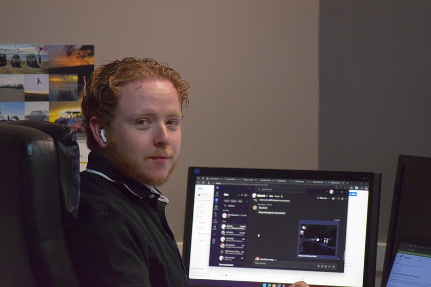 Mike Maynard sits at his desk at the Columbia Basin Herald. Earlier this year, he opted to take the leap and move from his home state of Ohio to the Columbia Basin.