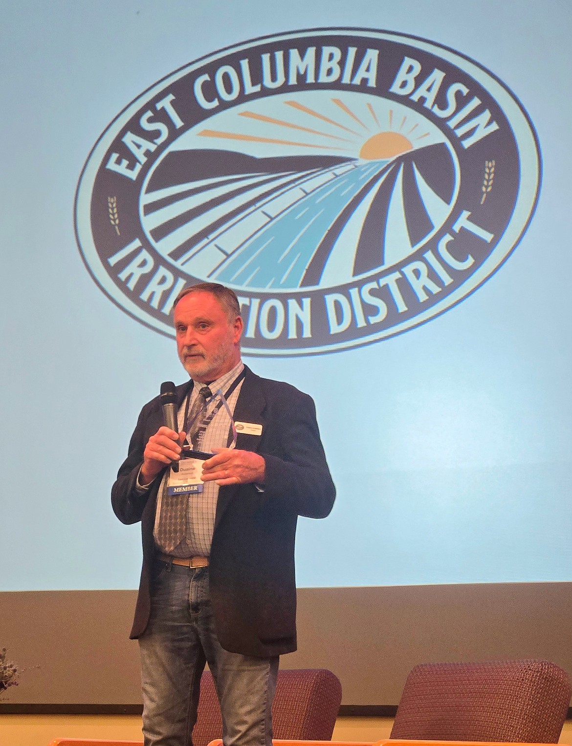 Duaine Anderson, ECBID board president, thanks his staff for their hard work while accepting the Perseverance Award from the CBDL.