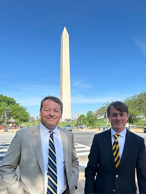 Steve Smith of Washington Fruit, Yakima, left, and Phillip Glaize III of Glaize Apples, Winchester, Virginia, right, stop for a picture between meetings with Trump Administration officials. Smith is the board chair for USApple, and Glaize is the organization’s vice-chair.