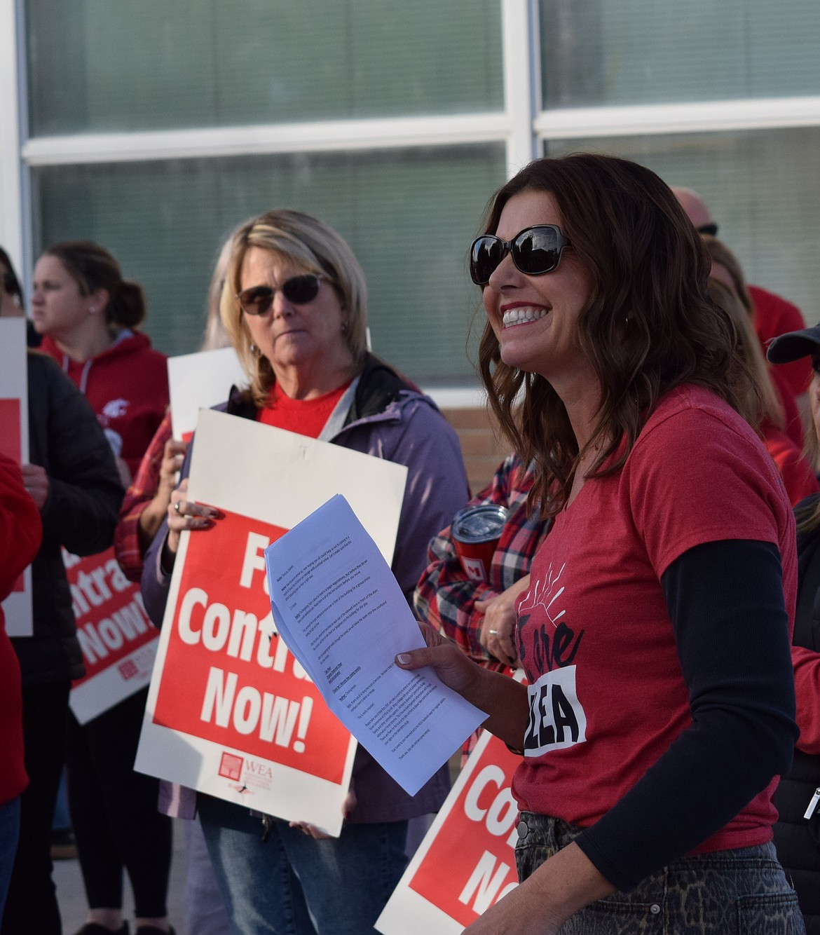 Moses Lake Education Association President Heather Whittall speaks during a protest at Moses Lake High School. A statement from Whittall leads the district to believe a work stoppage will happen beginning Monday regardless of negotiations Sunday.