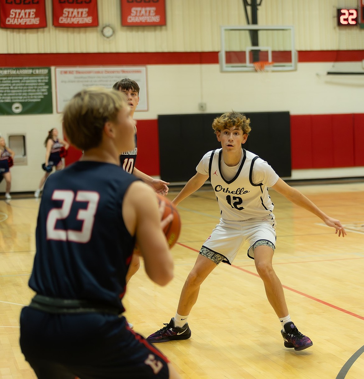Huskies player Gavin Simmons stays posted on defense with his eyes on the ball during a game last season. The Huskies return to the court with more experience and more chemistry this season.