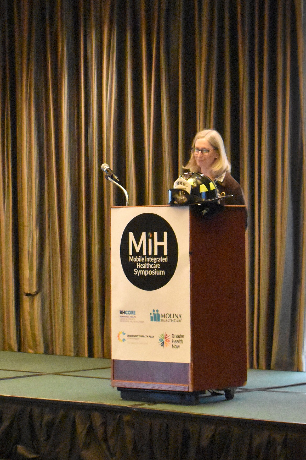 Dementia specialist Dr. A. Carroll Hayman speaks at the Mobile Integrated Health Symposium in Pasco.