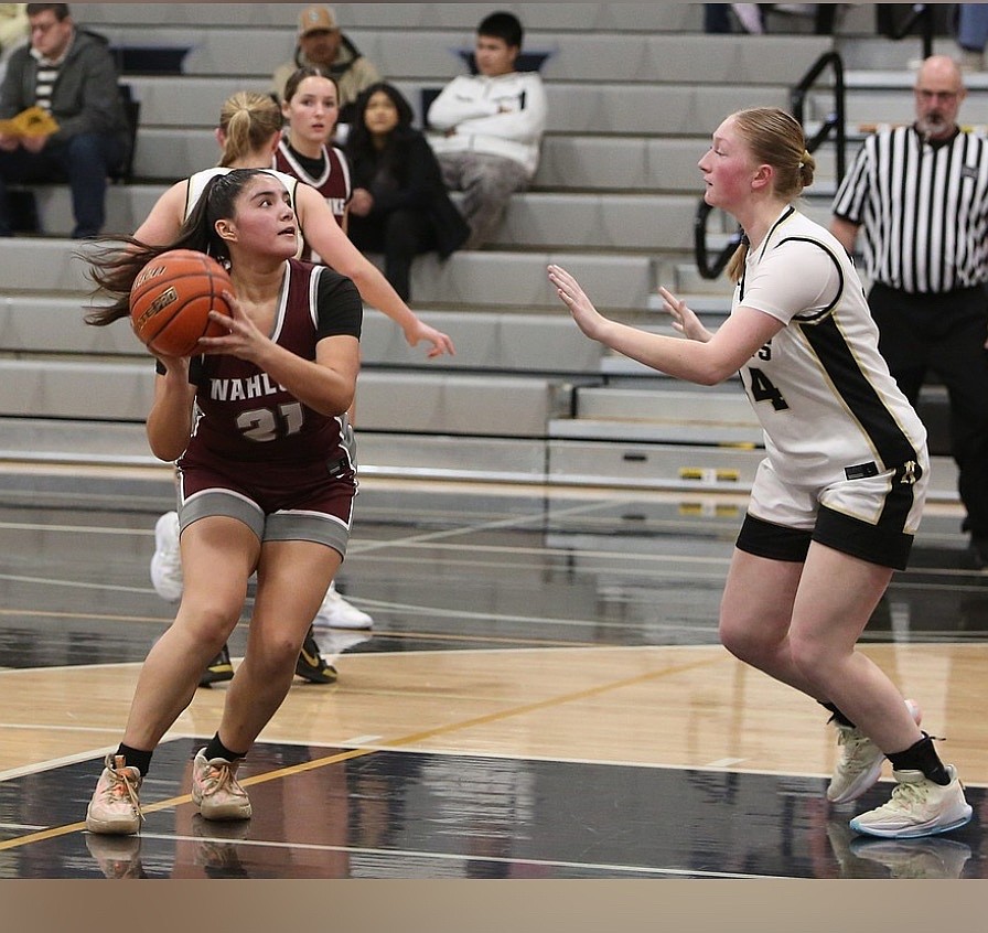 Avarie Hill, right, pressures a Wahluke player during a shot attempt last season. Head Coach Farrah Wardenaar said her team left everything they had on the court last season and feels confident they will build off that this season.