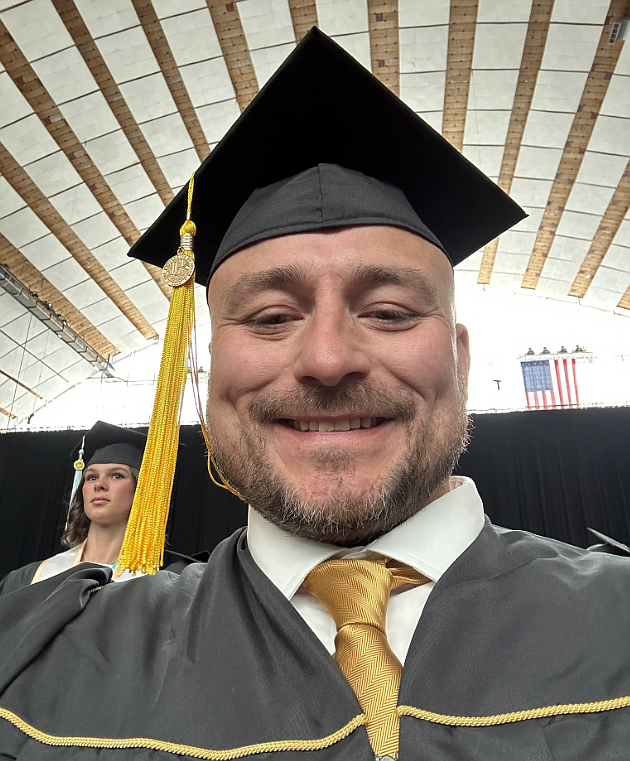 Paul Myers is seen on graduation day in spring 2025. He walked for commencement with just a few hours left to complete his teaching certificate. He will have his bachelor's degree in hand in less than 10 days.