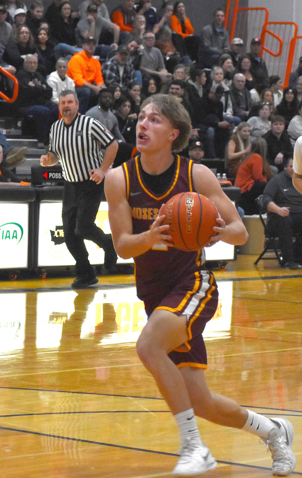 MLHS senior Brady Jay sprints toward the hoop to add two points for the Mavericks during Tuesday’s game against Ephrata.