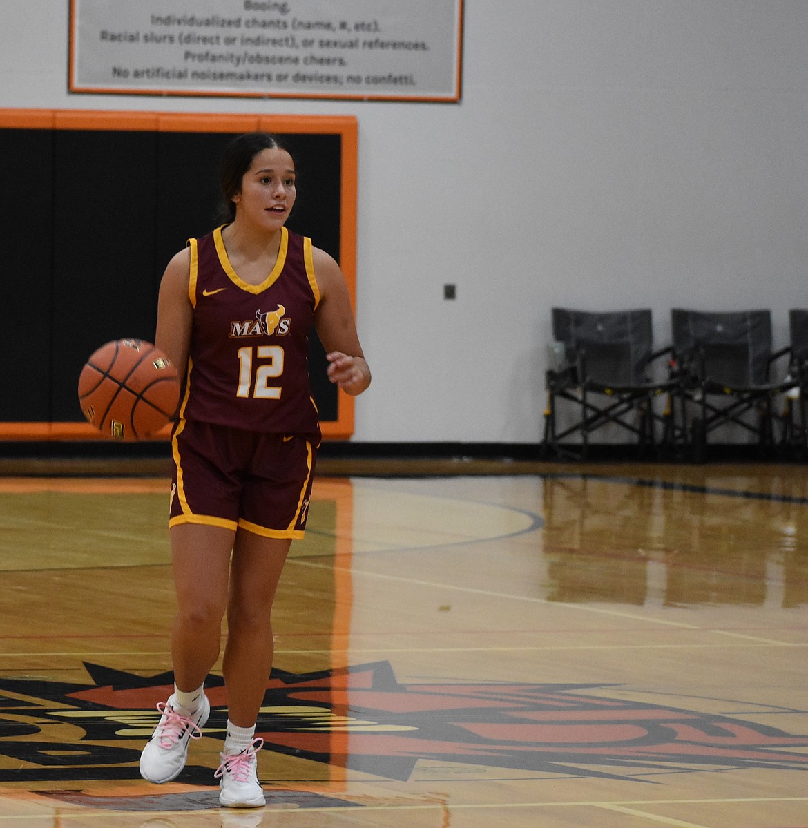 Boo Bischoff, a junior for the Mavs, makes her way toward the net after taking possession of the ball.