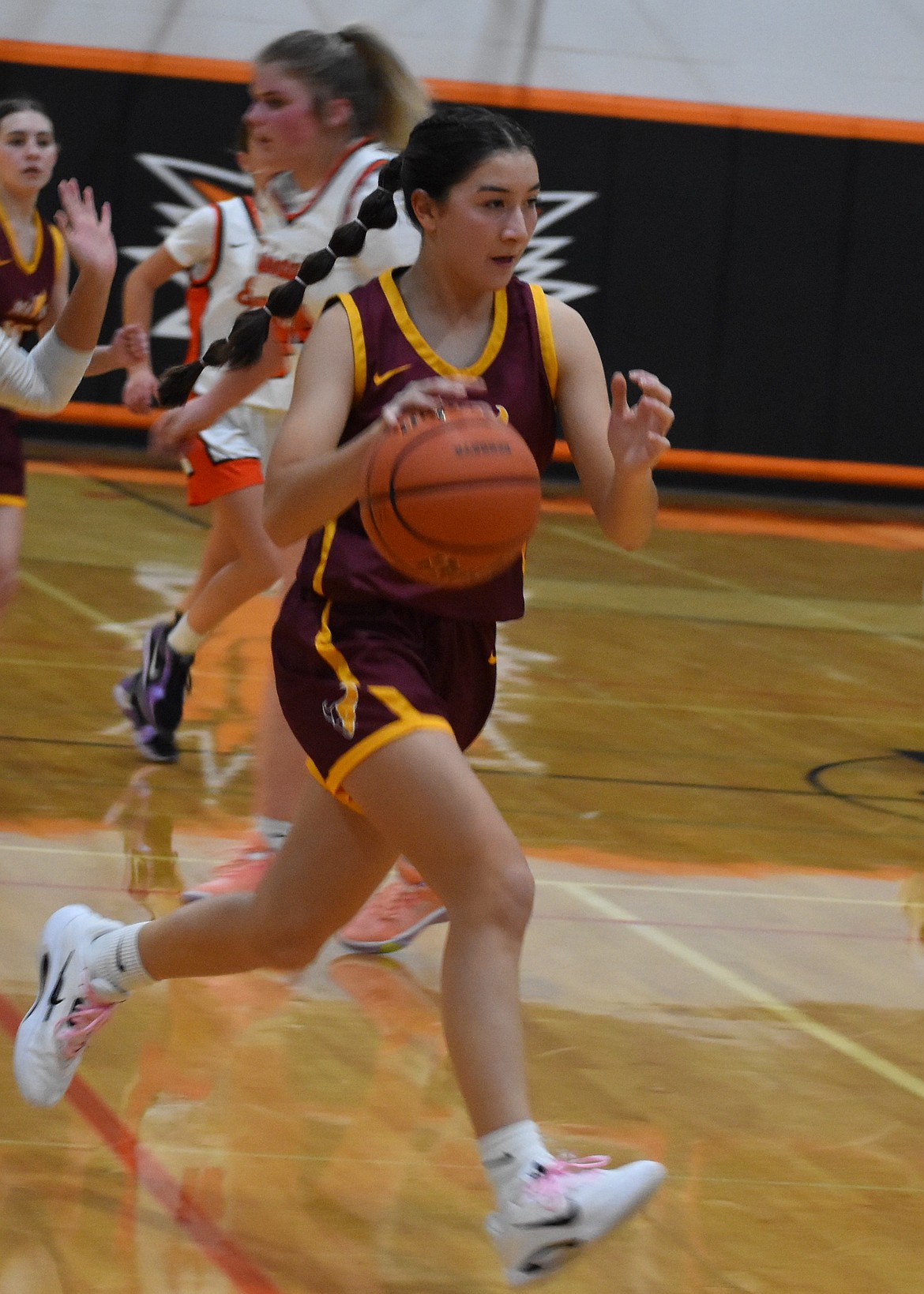 MLHS freshman Reese Char runs down the court to add two onto the scoreboard for her team during their first game of the season against Ephrata.