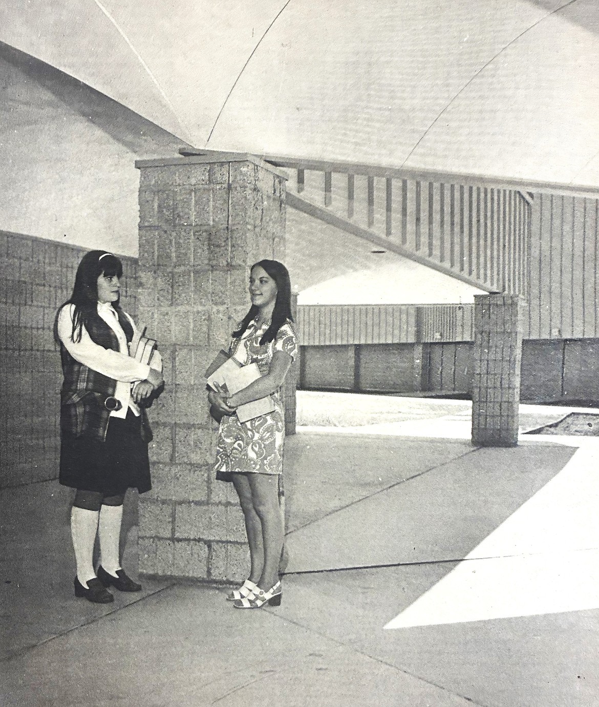 Anne Lunceford Capellen, right, and classmate Sally Lanham talk in the outside hallway at the new Coeur d’Alene High in 1970.