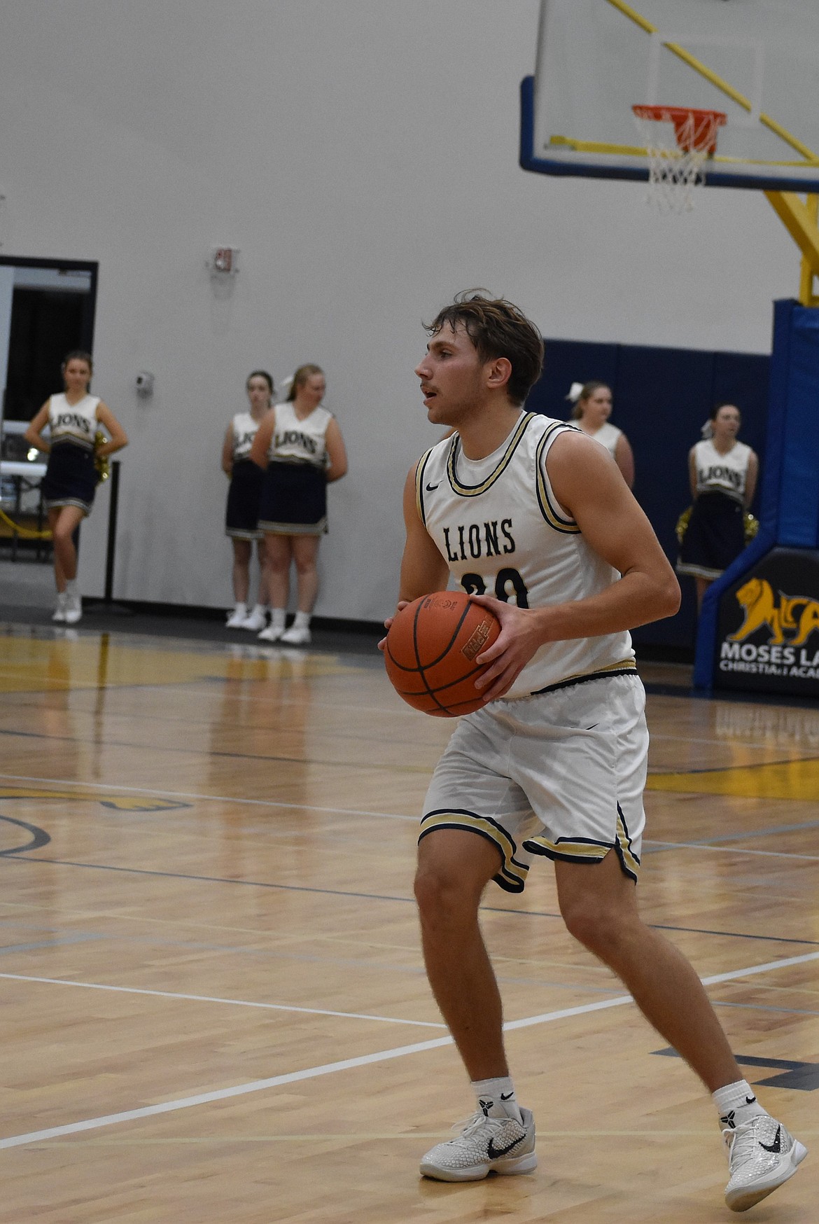 Max Gulenko, a junior at MLCA, decides his next move after being passed the ball during the first half against Entiat.