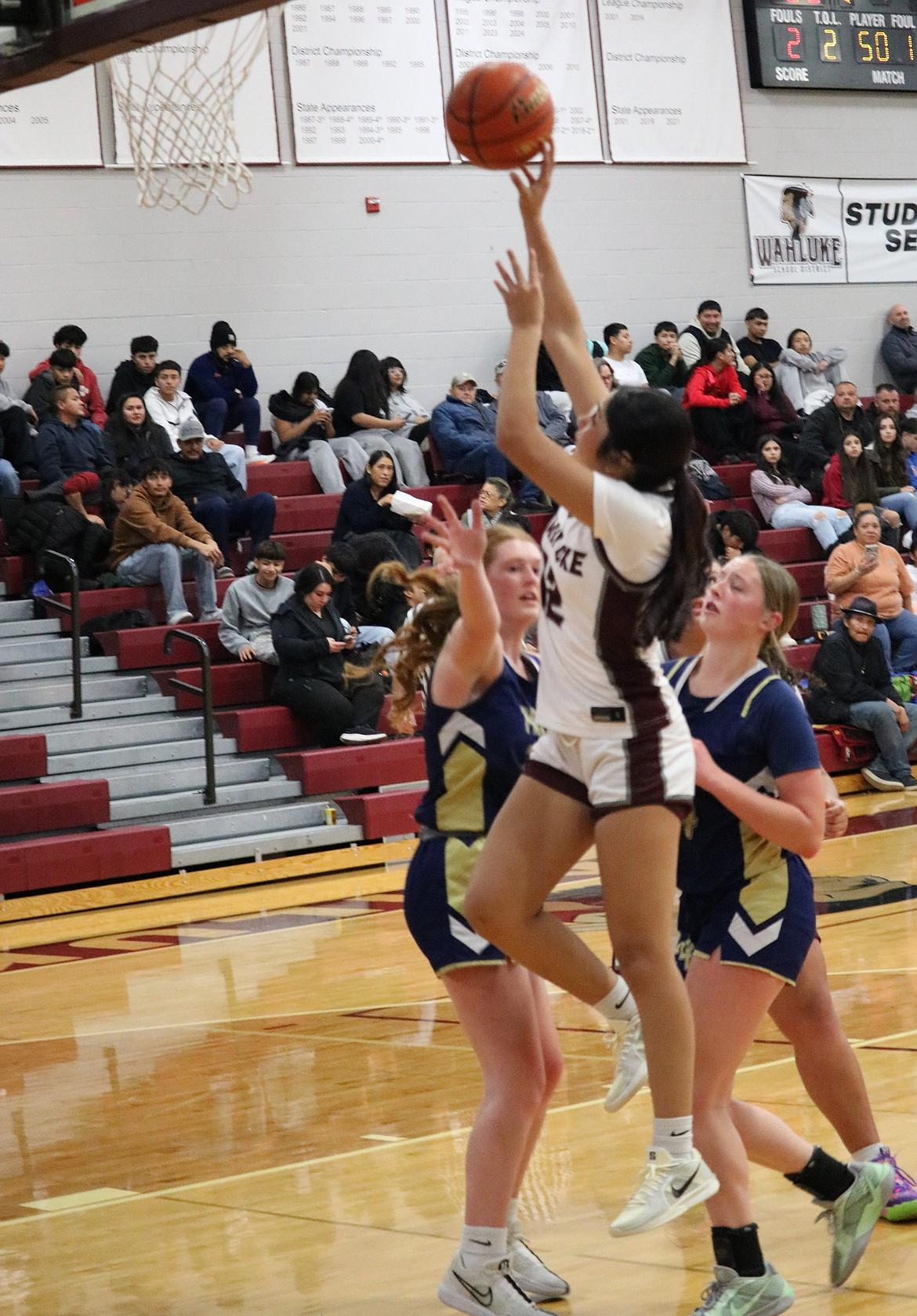 Mia Morales (12) goes up for two points on a contested shot. Head Coach Makai Hirai said his players showed a lot of effort and motivation to compete, which he was proud of.