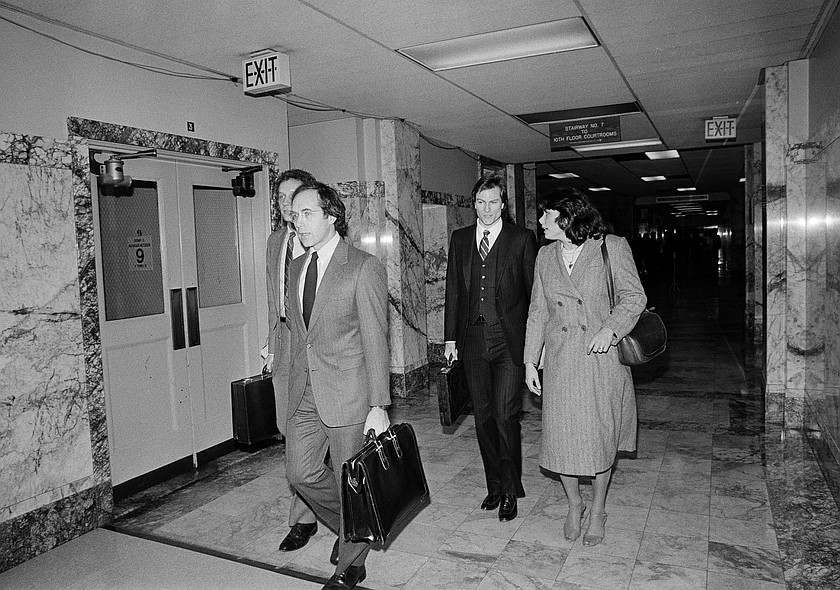 Kevin Coe, at left in dark suit, arrives at Superior Court in Seattle, Wash., with his sister, Kathy Coe, for the start of the retrial in the case of the Spokane, Wash., South Hill rapist, Jan. 8, 1985. Coe, who was convicted in 1981, died Wednesday.