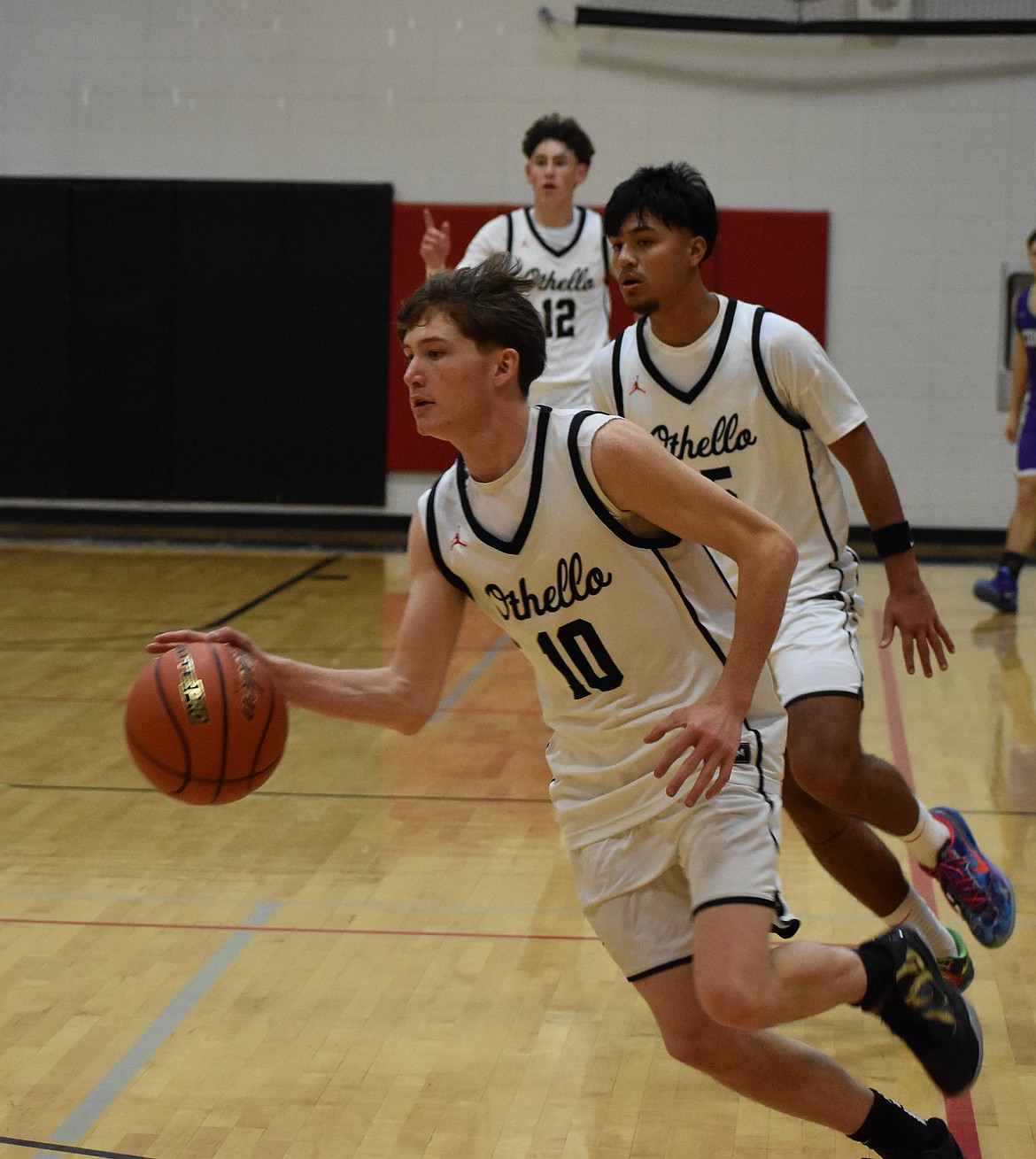 Huskies junior Brodee Henley hooks towards the box as the team puts offensive pressure on Connell.
